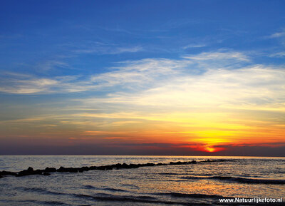 ansichtkaart zonsondergang Noordzee